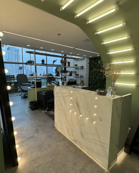 Lit marble counter under the reception arch.